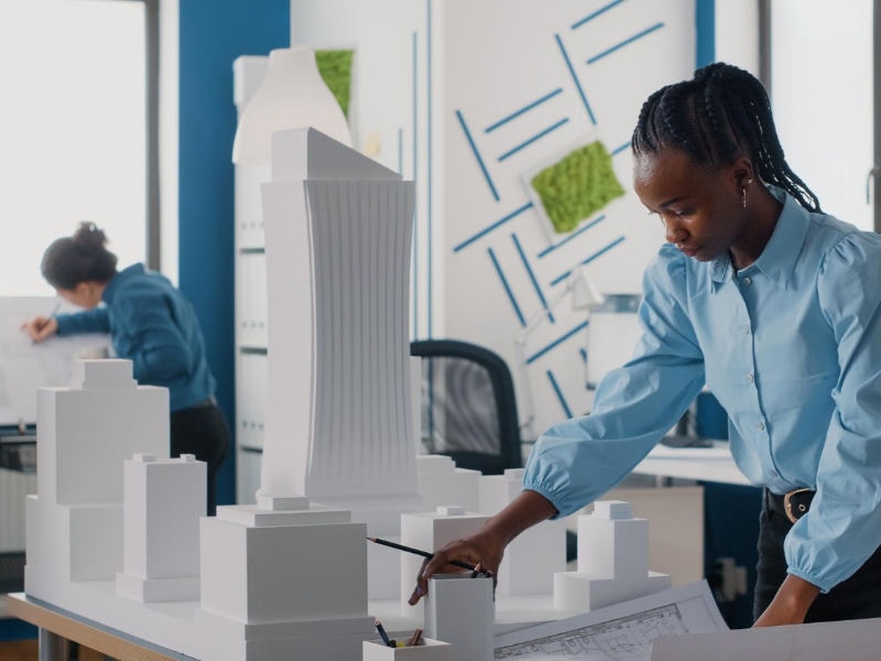 Female architects observing work